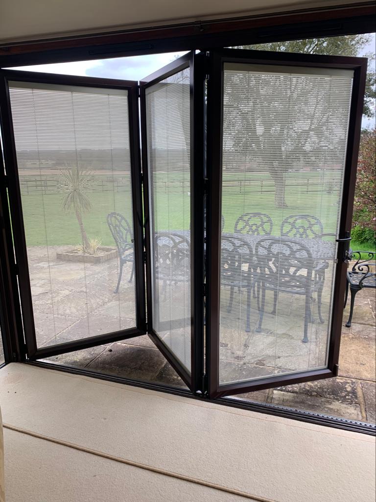 Bi Fold Doors with inbuilt electric blinds used The Used Kitchen Company
