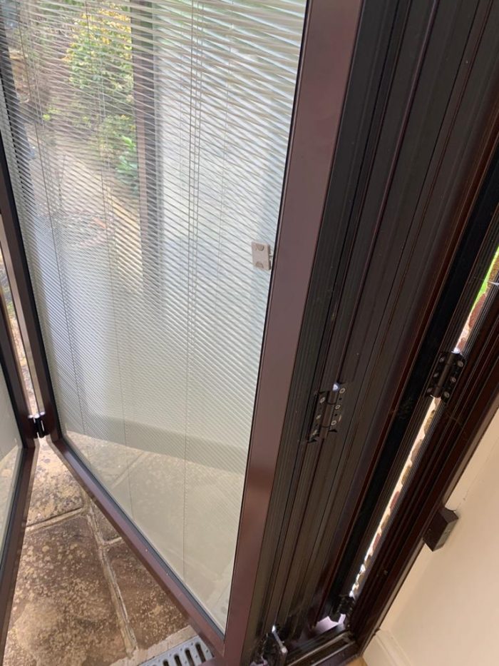 Bi Fold Doors with inbuilt electric blinds used The Used Kitchen Company