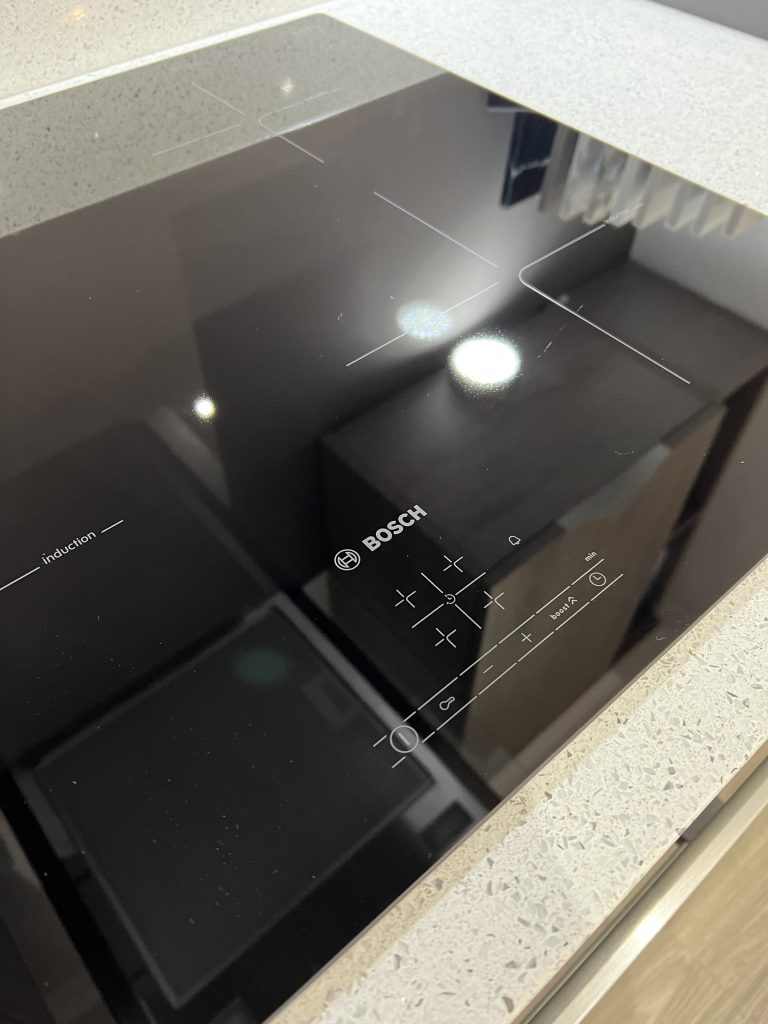 Ex Display Truffle Brown Denver Oak Kitchen with Silestone Worktops and