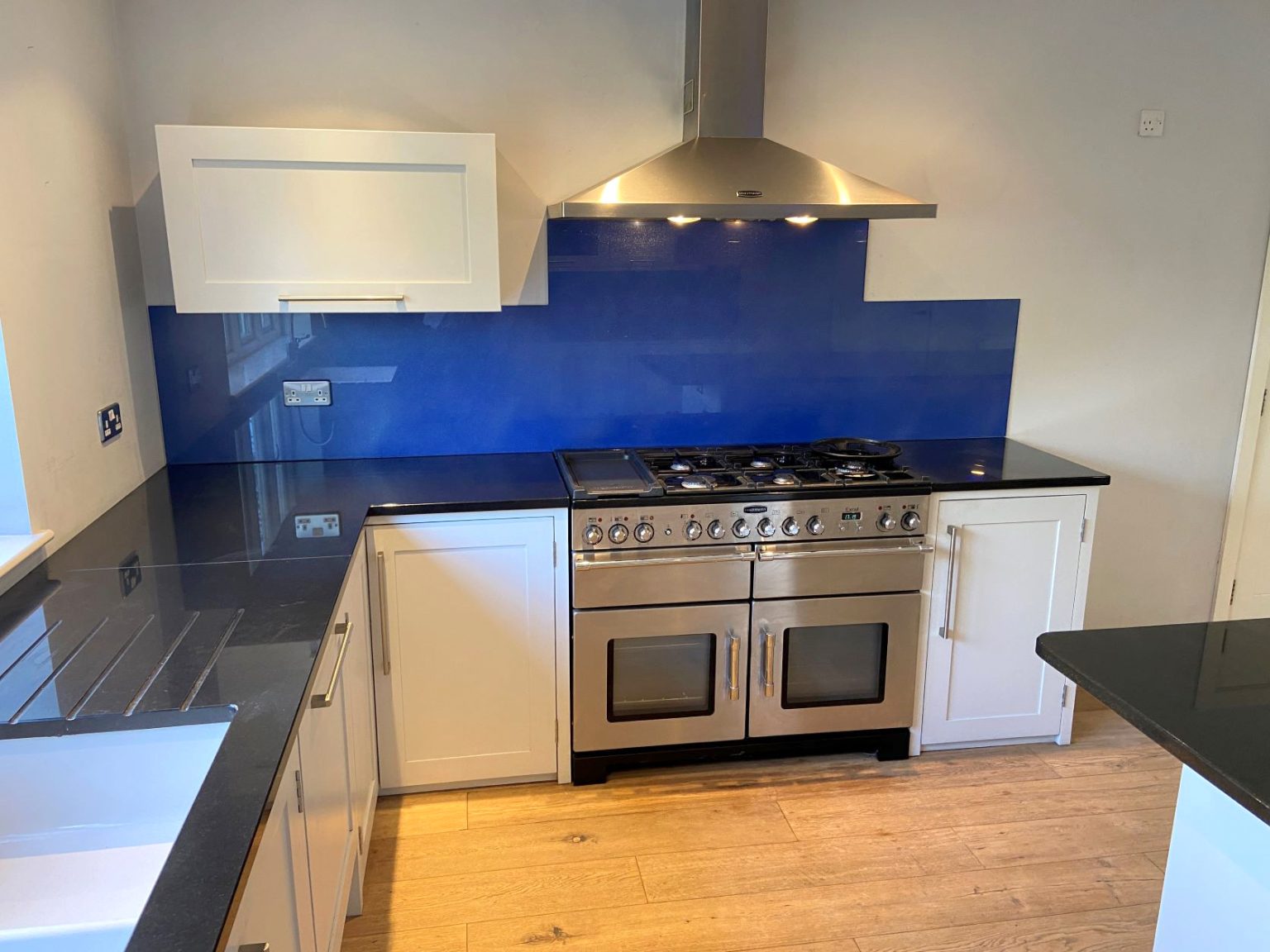 Kitchen With Island, Worktops and Some Appliances Used The Used