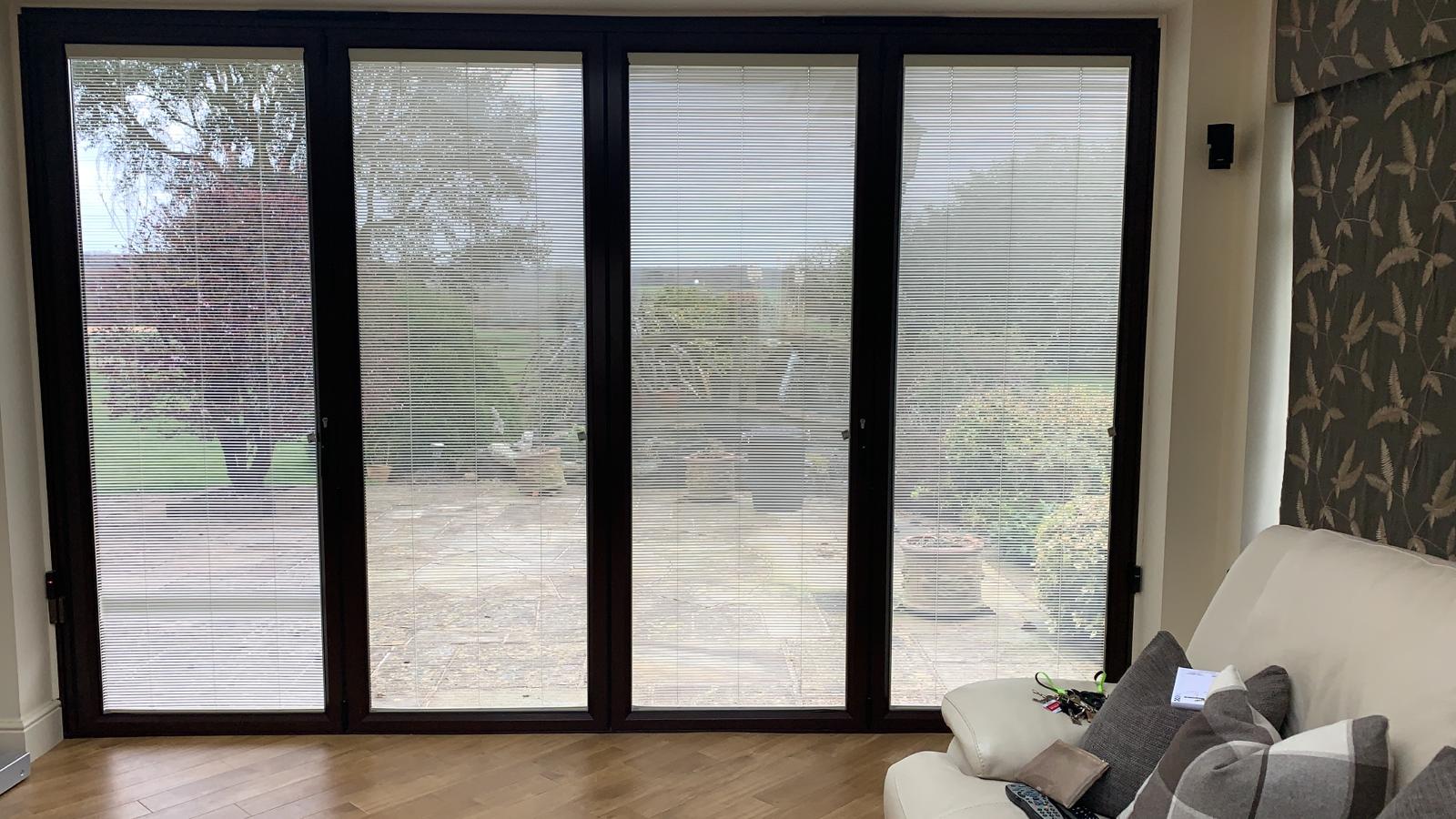 Bi Fold Doors with inbuilt electric blinds used The Used Kitchen Company