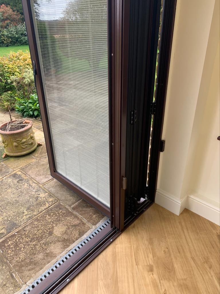 Bi Fold Doors with inbuilt electric blinds used The Used Kitchen Company