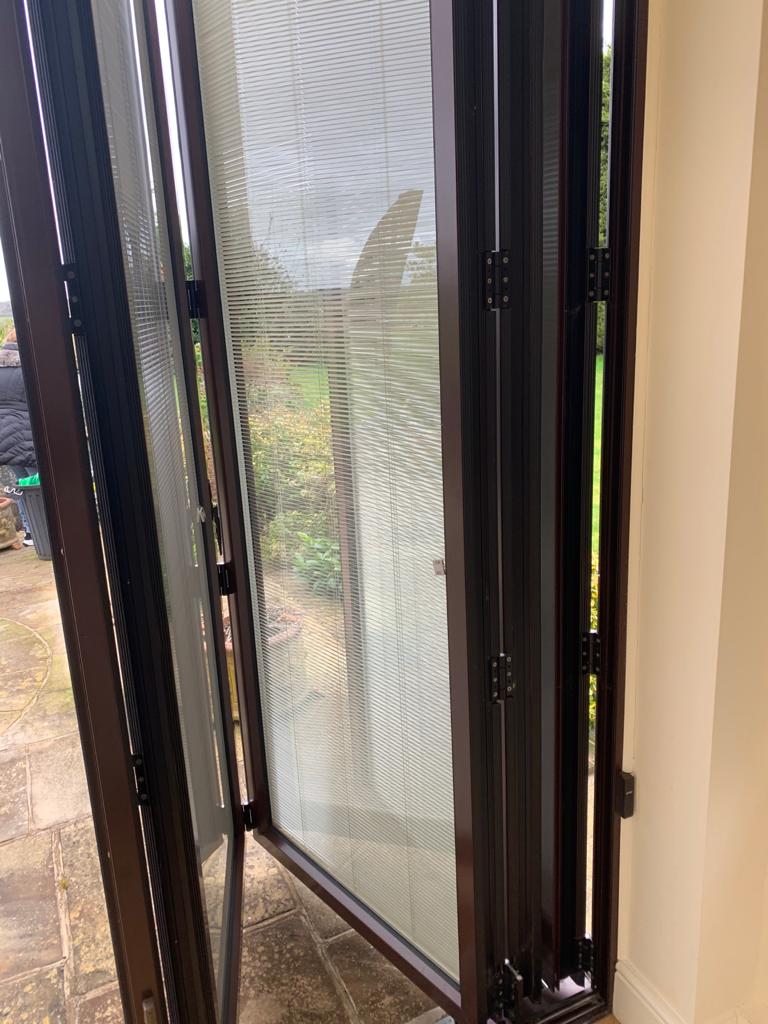 Bi Fold Doors with inbuilt electric blinds used The Used Kitchen Company