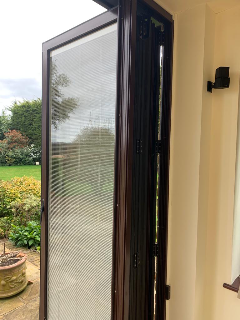 Bi Fold Doors with inbuilt electric blinds used The Used Kitchen Company